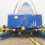 Lowering the ttransport box onto the loading rails