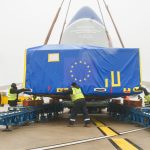 Lowering the ttransport box onto the loading rails